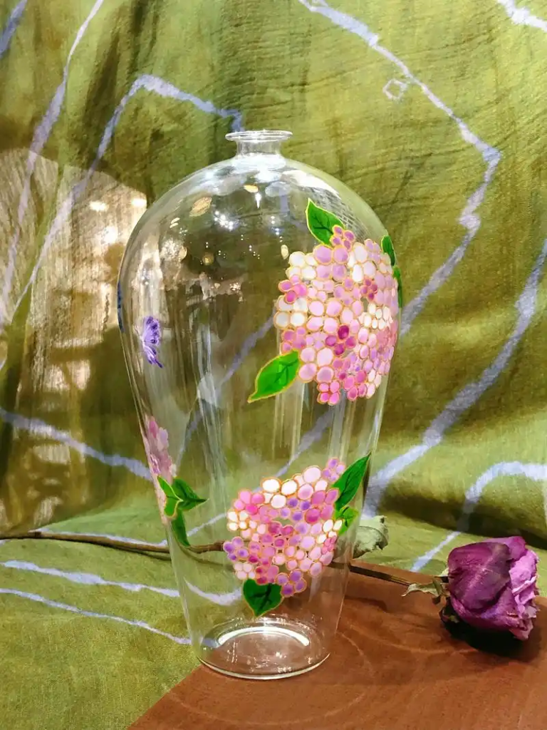 Decal treatment for glass bottles