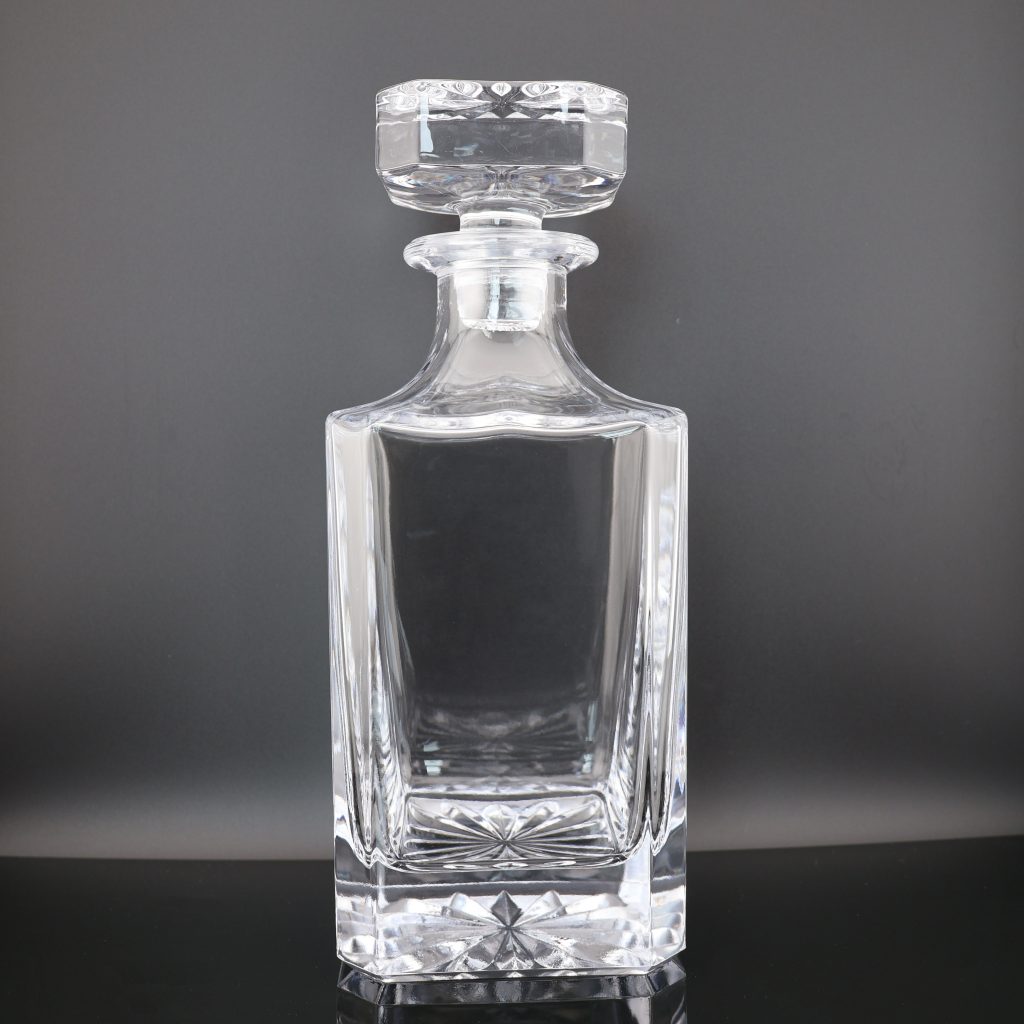 Heavy solid base and uniform 5mm wall thickness of a manufactured glass spirit bottle
